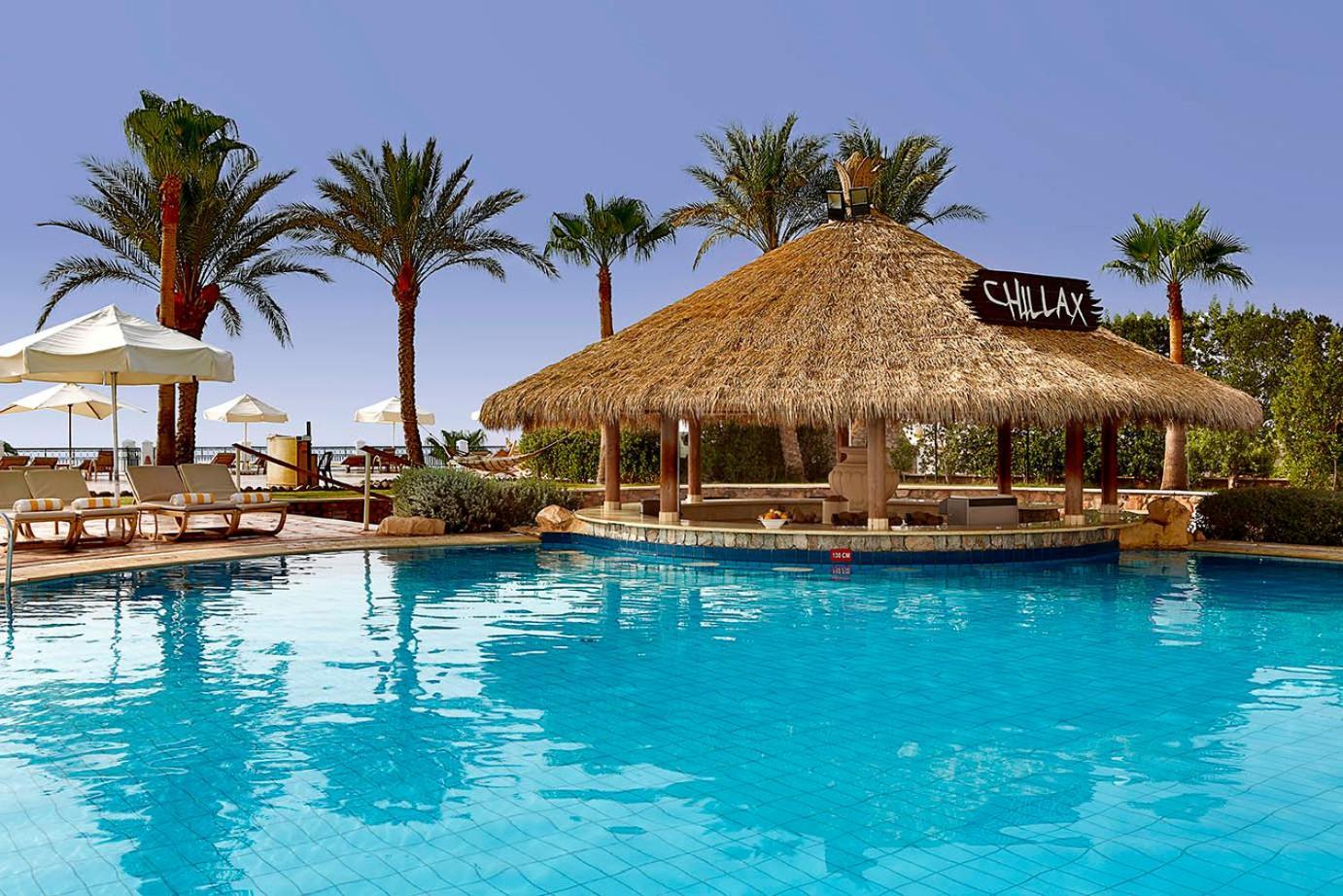 Safir Sharm Waterfalls Resort Exteriör bild The pool at the Hilton Sharm El Sheikh